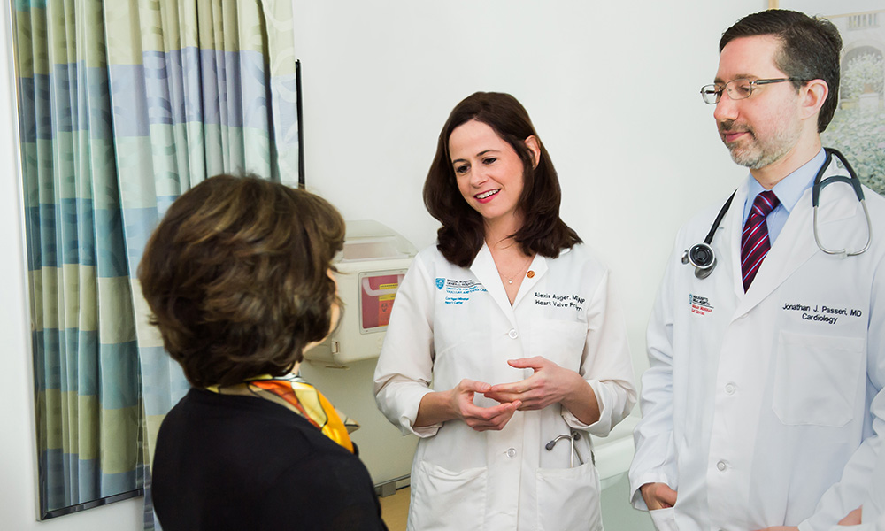 Doctors at the Corrigan Minehan Heart Center meet with a patient Doctors at the Corrigan Minehan Heart Center meet with a patient